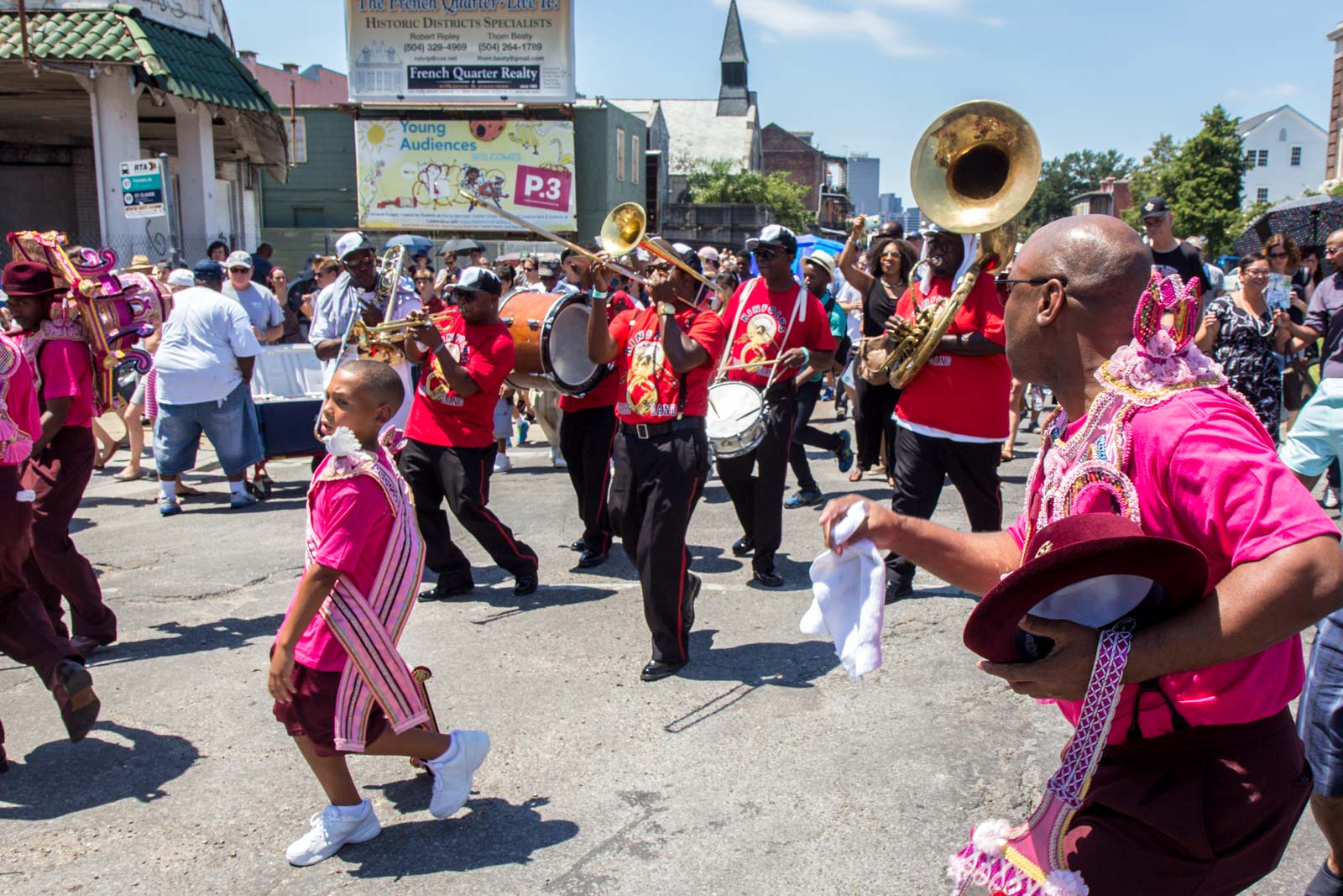 A Second Line parade through the streets of New Orleans
